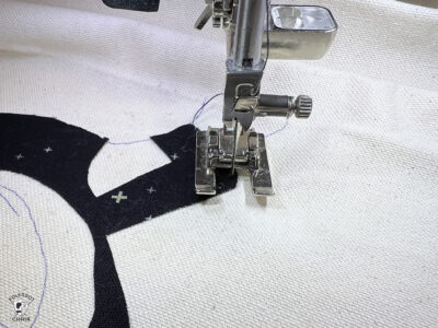 close up of sewing machine foot