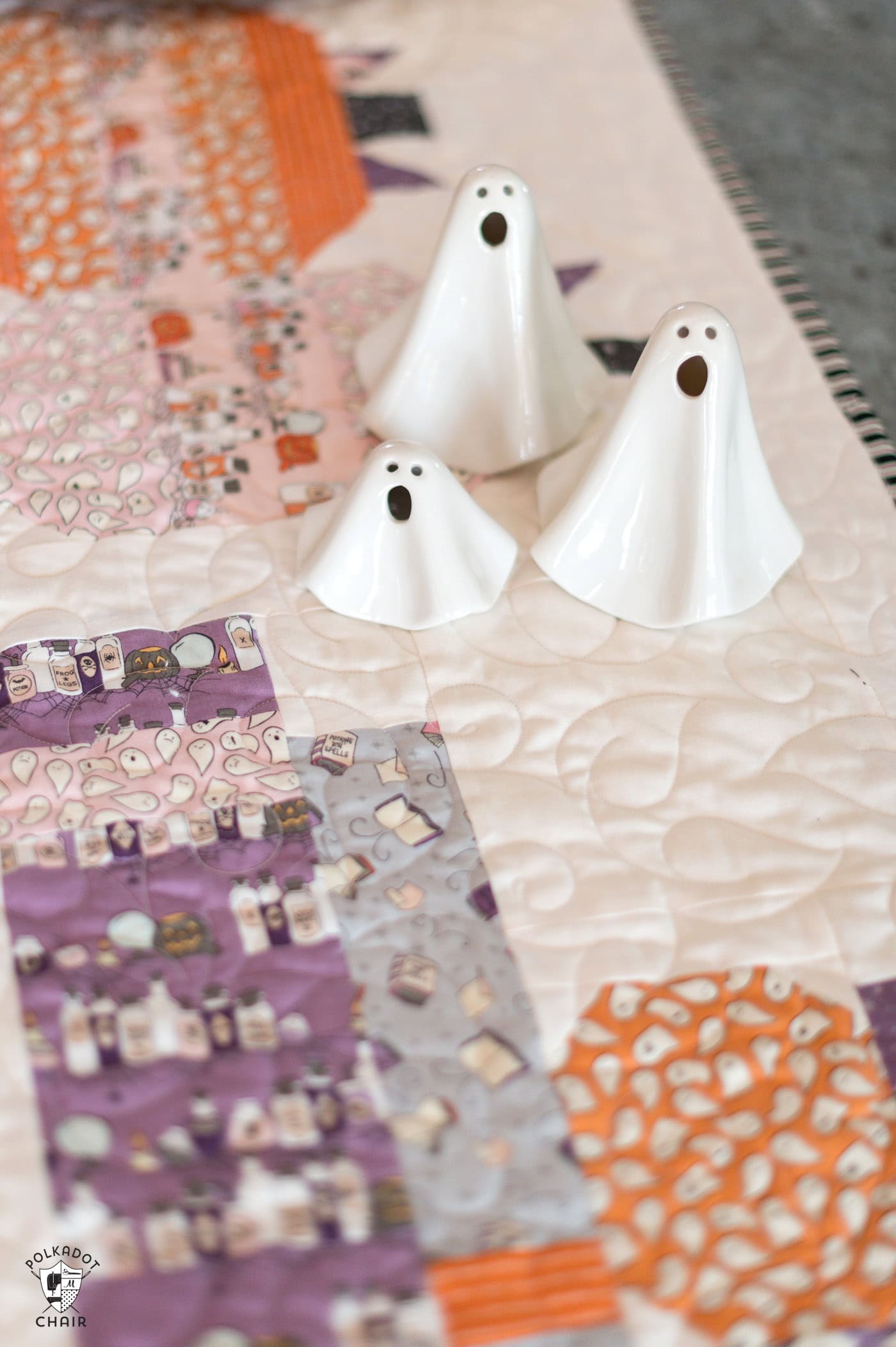 close up of halloween table runner on metal table