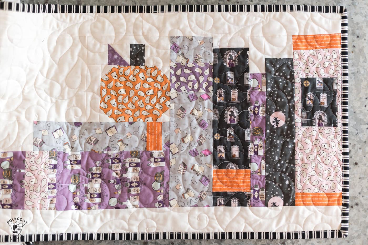 close up of halloween table runner on metal table