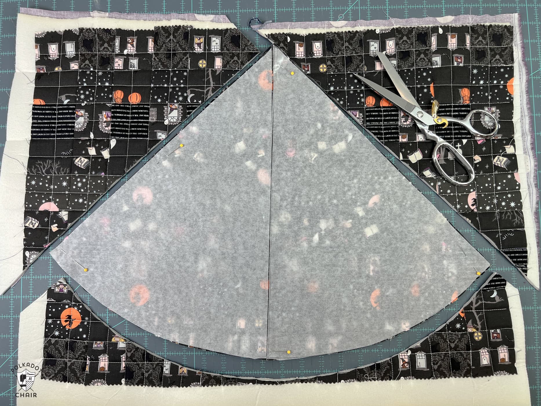 pattern piece laid out on quilted fabric