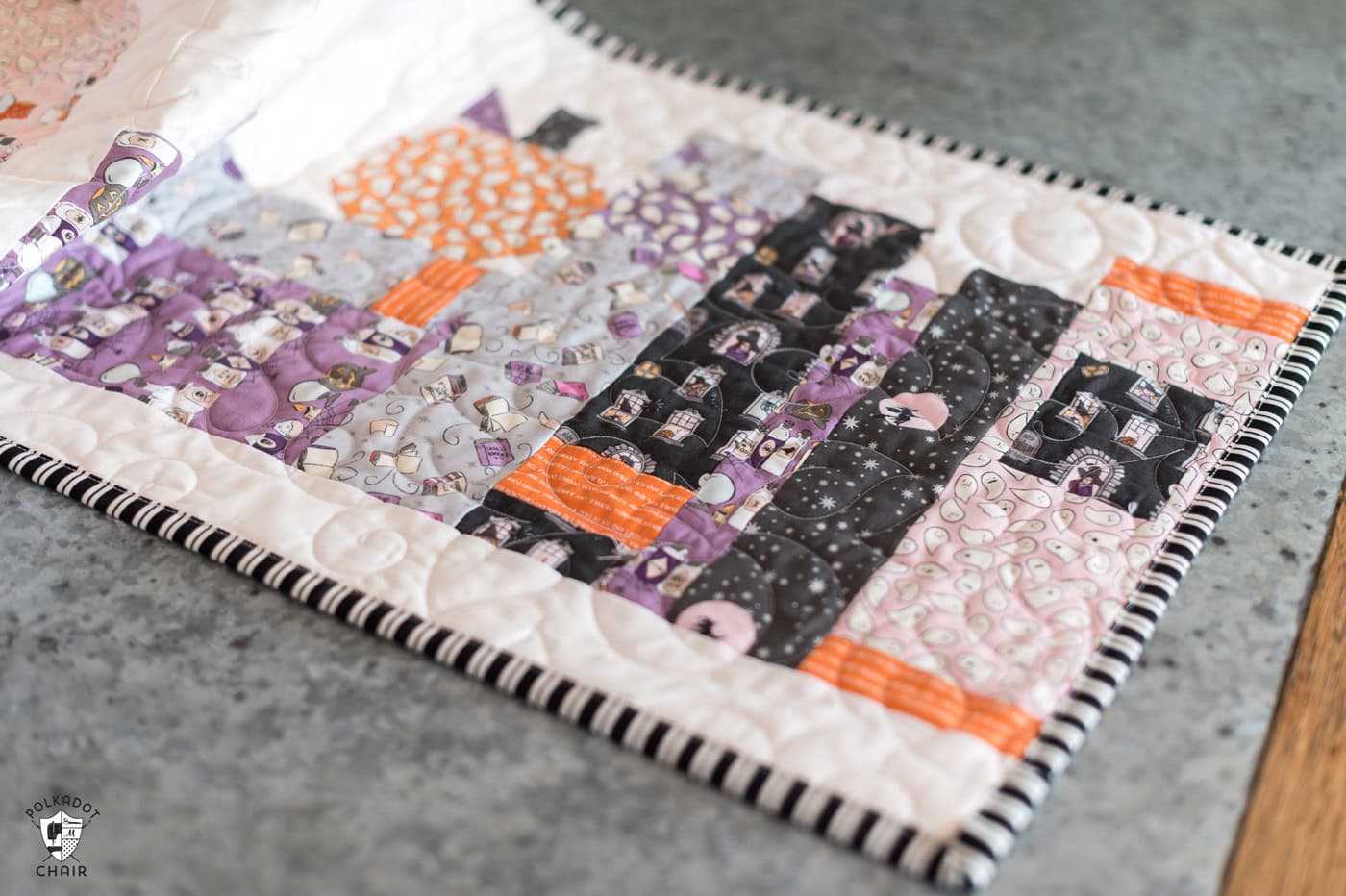 close up of halloween table runner on metal table