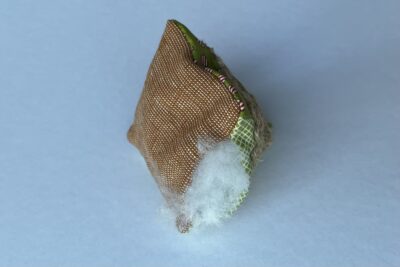 stuffing added to pincushion