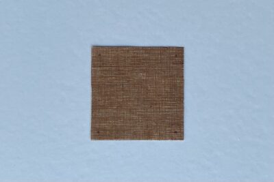 brown fabric on white table