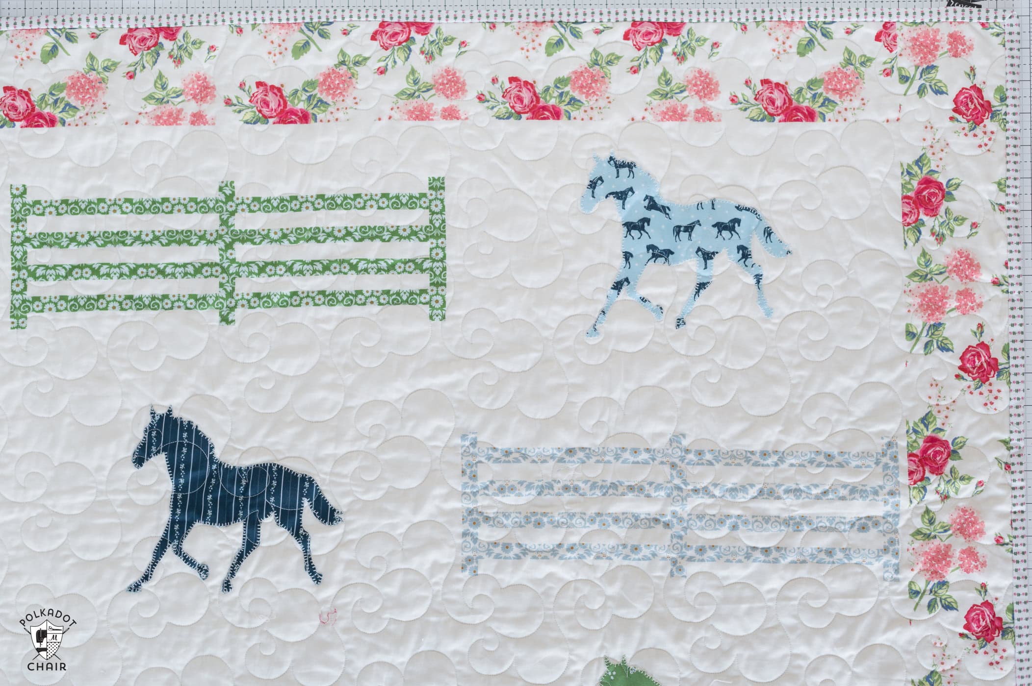 horse and horse fence quilt blocks on wall