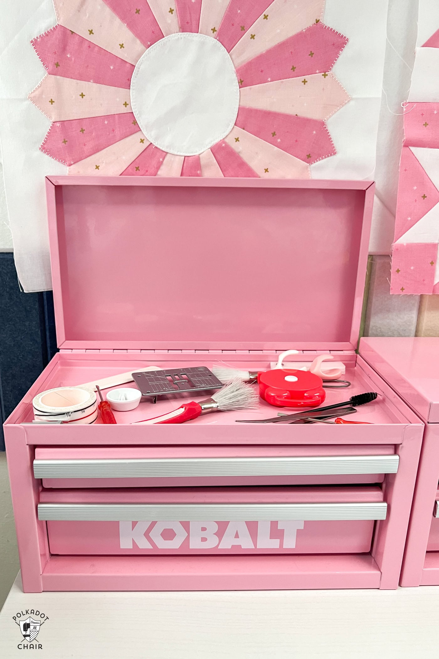 pink sewing box on table