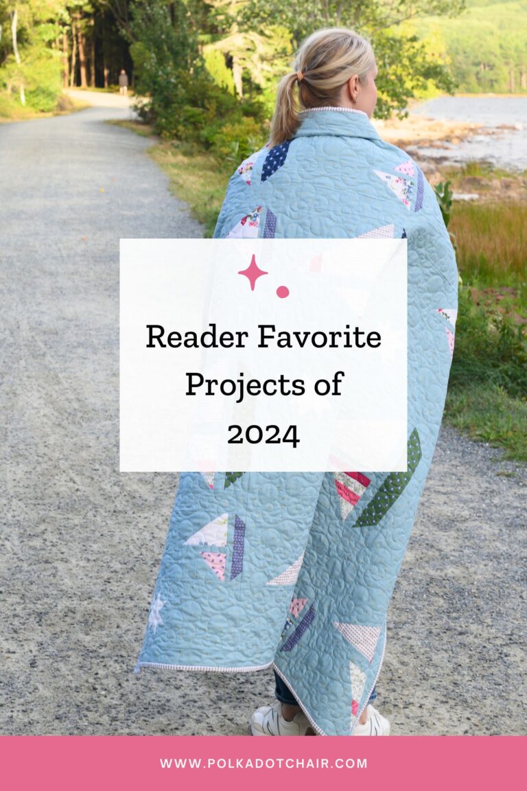 Woman with quilt draped around back, outdoors in woods near lake - image has text overlay