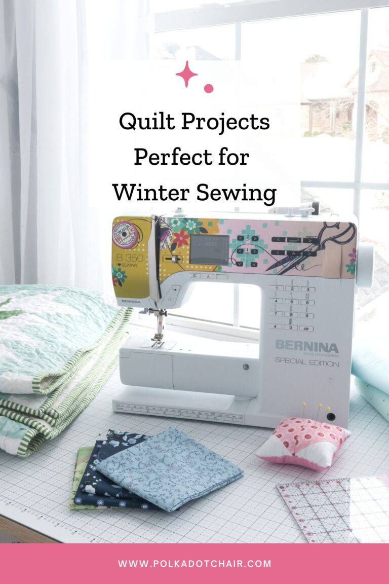 Sewing machine and notions on table by window in winter