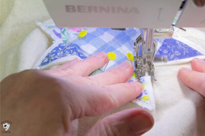 quilt block under sewing machine foot