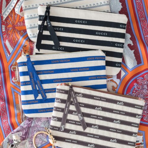 colorful striped ribbon zip pouches on scarf