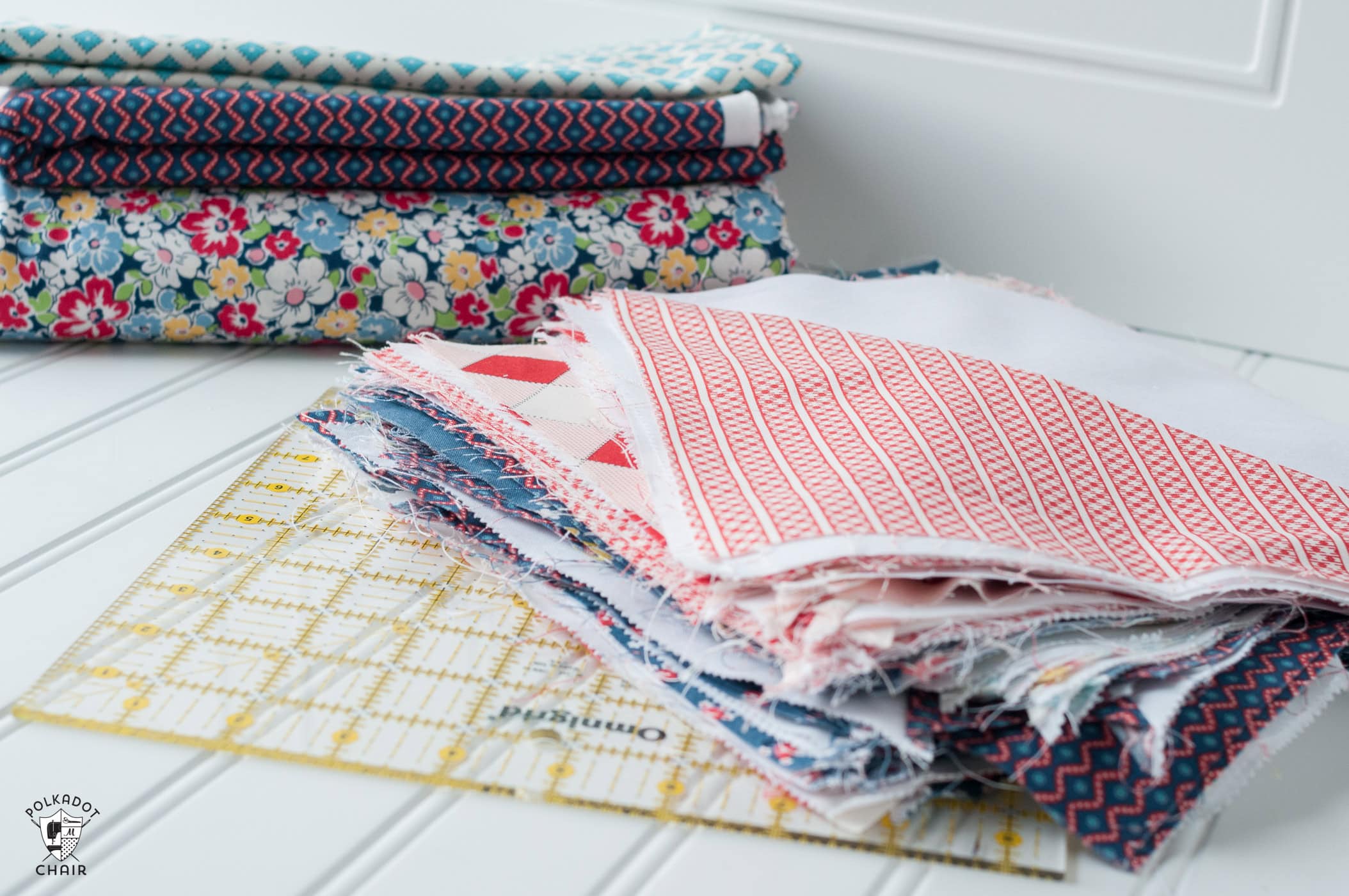 stack of fabric and ruler on coutertop