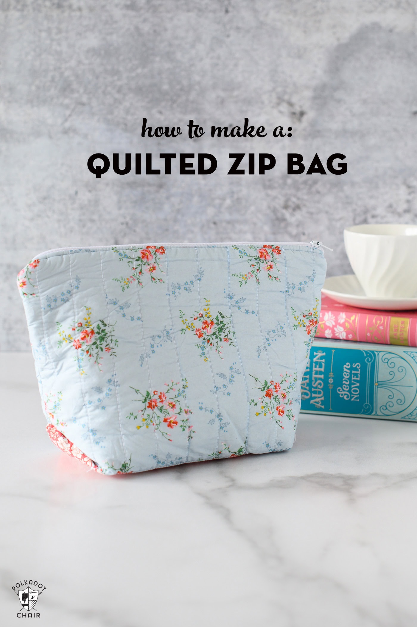 blue zippered pouch on table with books in the background