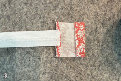 construction process of zip bag featuring blue floral fabric and coral floral fabric