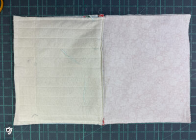 construction process of zip bag featuring blue floral fabric and coral floral fabric