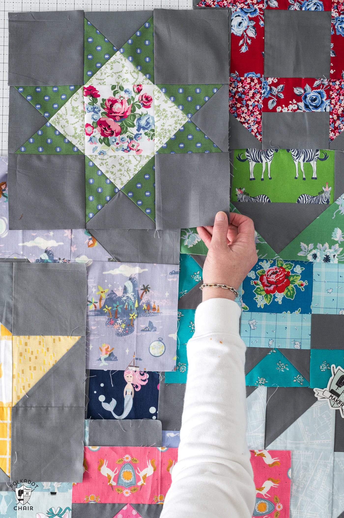colorful quilt blocks on white cutting mat