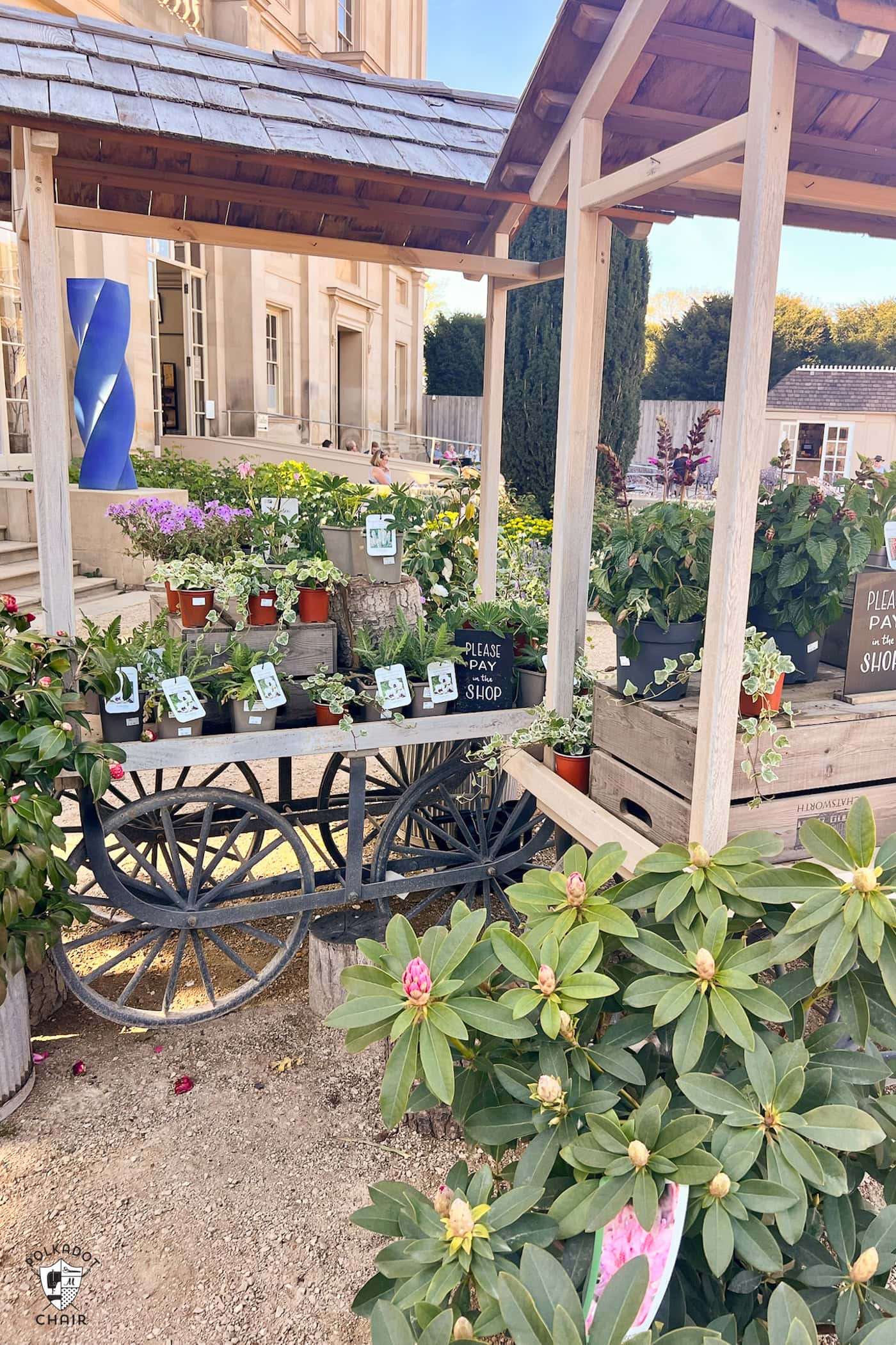 flower cart outdoors with many flowers