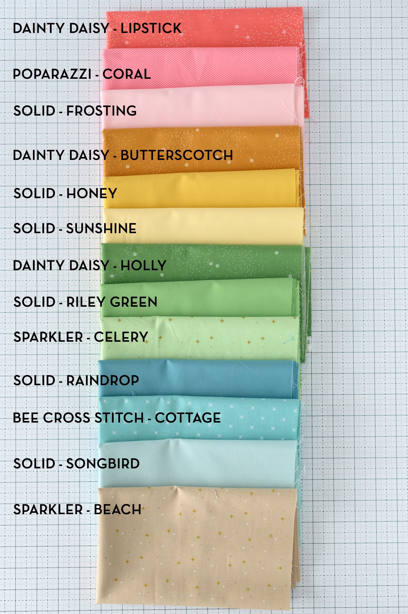 colorful fabrics on cutting mat