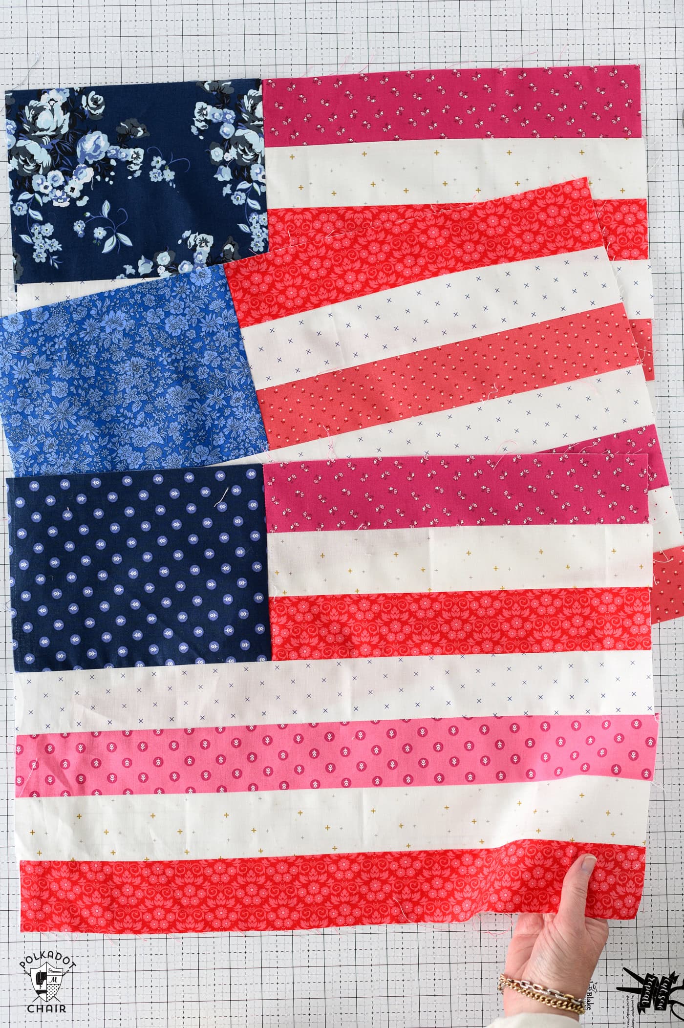 three american flag quilt blocks on table