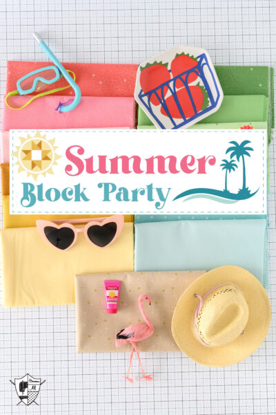 colorful fabrics on cutting mat with summer accessories