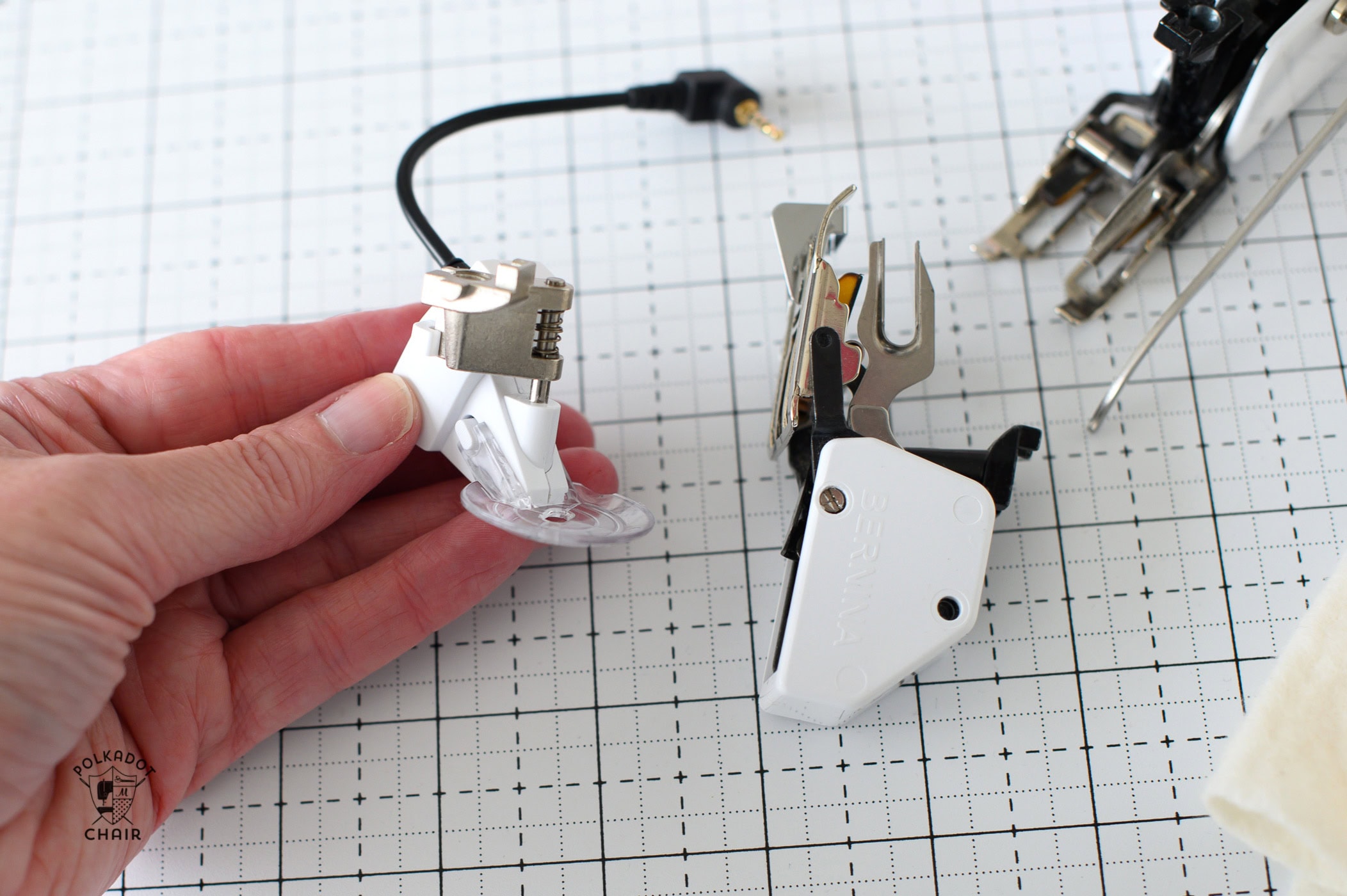 walking foot on white cutting mat