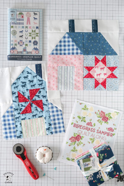 barn, house quilt blocks with fabric and paper on cutting mat