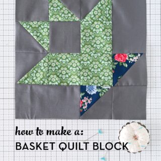 Green and blue basket quilt block on gray background
