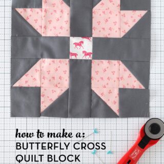 pink and gray quilt block on white cutting mat