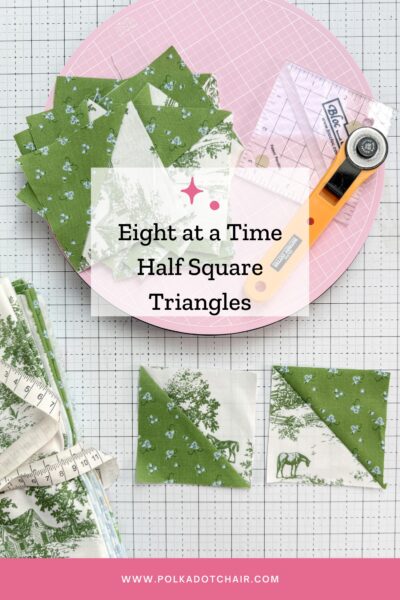 green and white half square triangles on white cutting mat