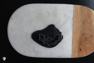 Clay being cut out on cutting mat