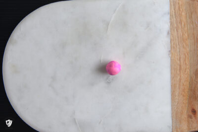 Clay ball on cutting board