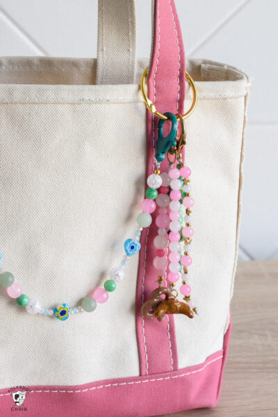 bag charms on pink canvas tote bag
