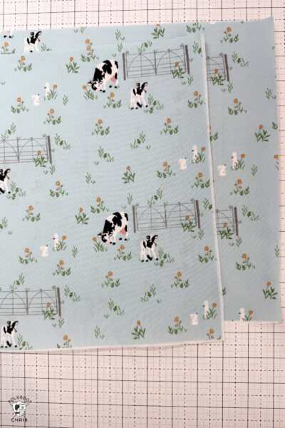 blue fabric on white cutting mat