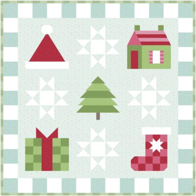 illustration of blue, green pink and red christmas quilt with part of the quilt blurred out