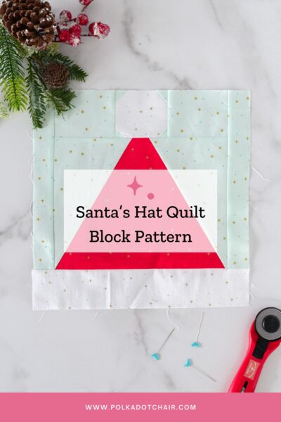 Santa hat quilt block on white table