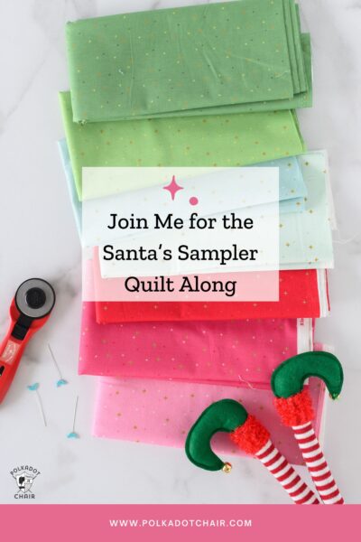 pink, red, blue and green fabrics folded on white marble countertop