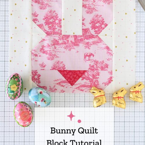 pink bunny quilt block on white cutting mat with easter candy