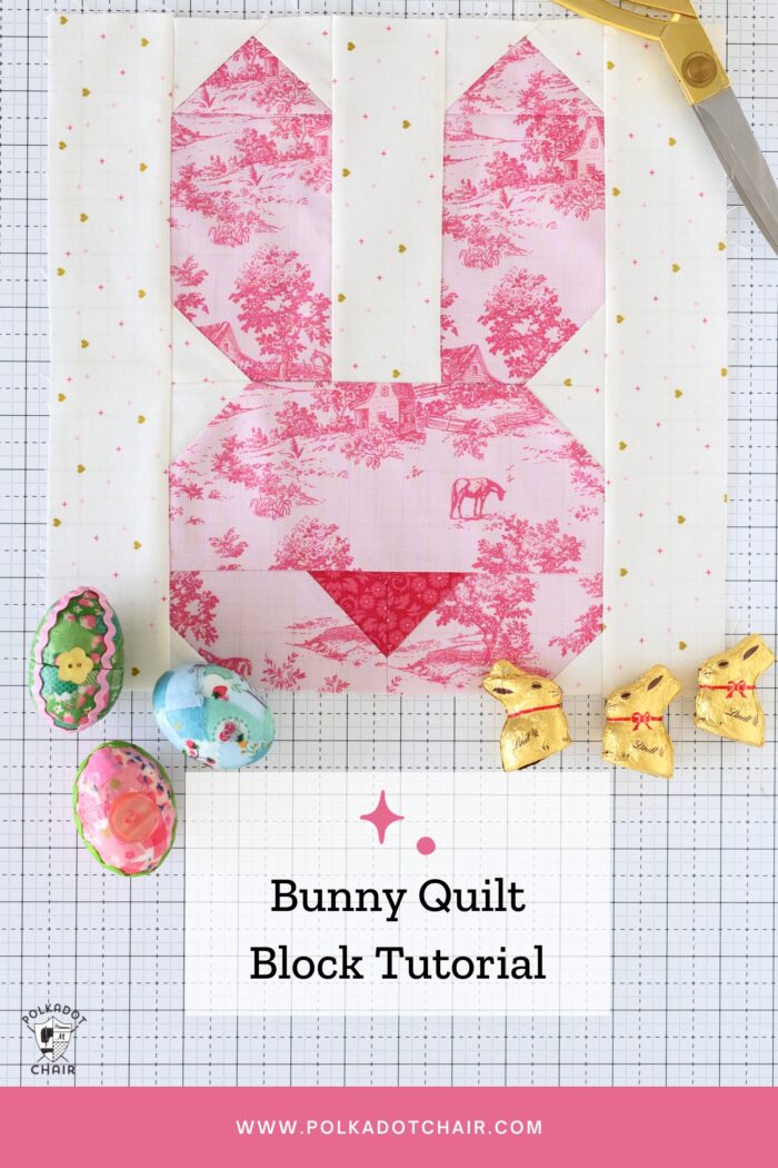 pink bunny quilt block on white cutting mat with easter candy
