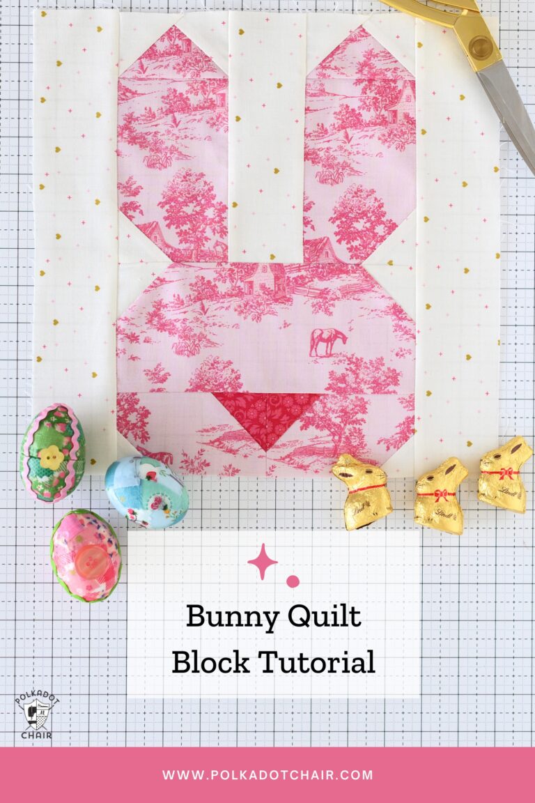 pink bunny quilt block on white cutting mat with easter candy