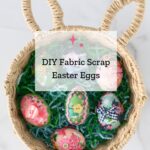 fabric easter eggs in wicker basket with faux grass