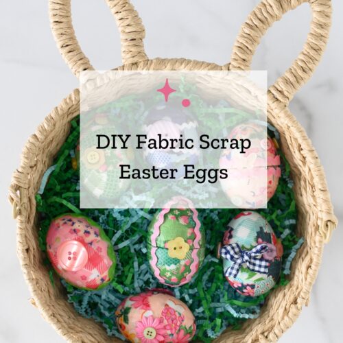 fabric easter eggs in wicker basket with faux grass