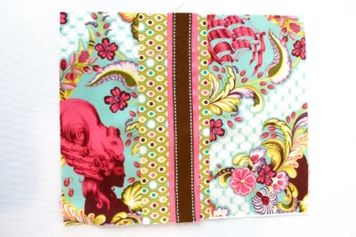 Sewn pattern fabric with ribbon