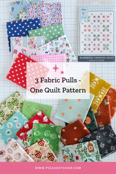 3 piles of fabric, halloween, red blue and pink and christmas on white cutting mat with paper quilt pattern