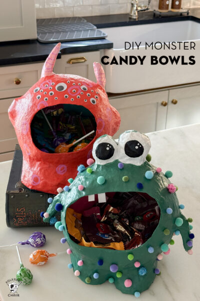 orange and green paper mache candy bowls on kitchen counter